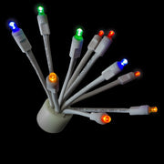 A collection of LED lighting bulbs with white bases, displaying various colors including red, green, blue, and multicolor.