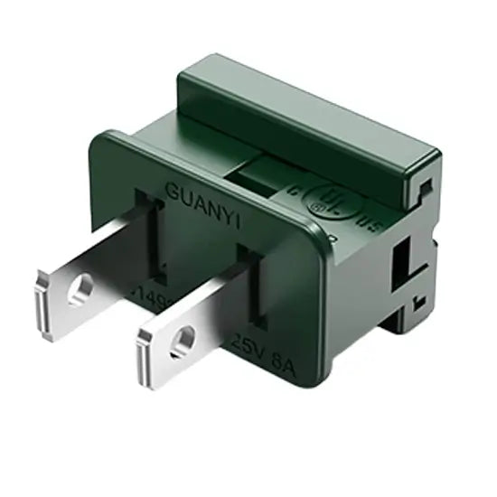 Green electrical plug on a white background
