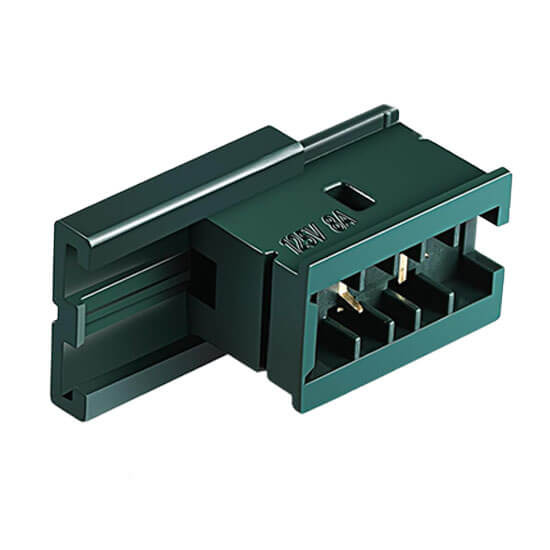 Green plastic component on a white background