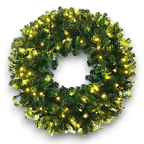 Green Christmas wreath with lights on a white background