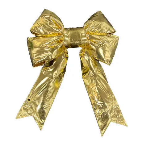 Gold metallic bow on a white background