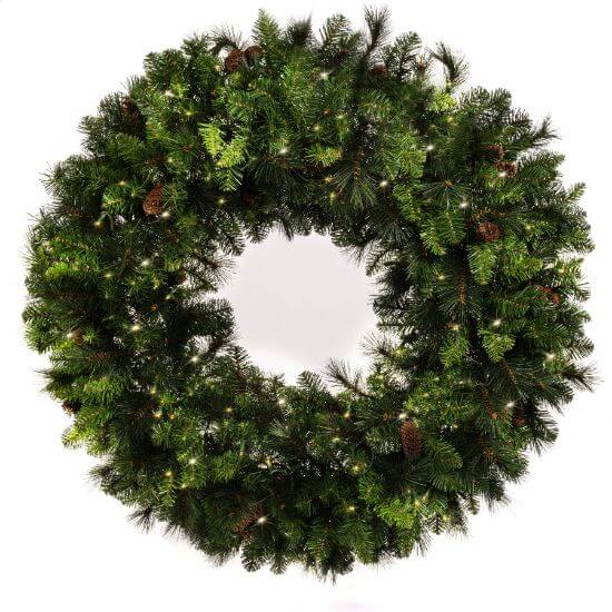 Christmas wreath with lights and pinecones on a white background
