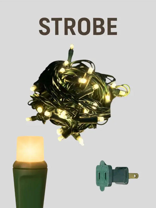 String lights with a candle and plug on a gray background, featuring the word 'STROBE'.
