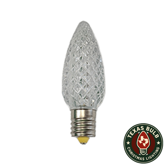 Decorative Christmas light bulb with textured design on a white background, featuring the Texas Bulb logo.